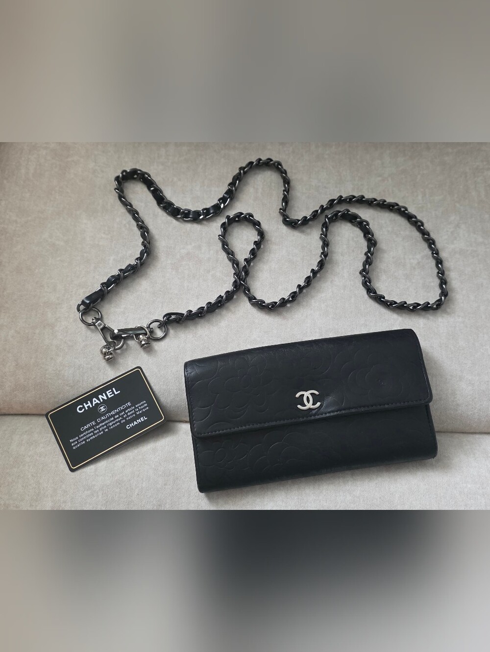 CHANEL Black Camellia Embossed Lambskin Long Wallet